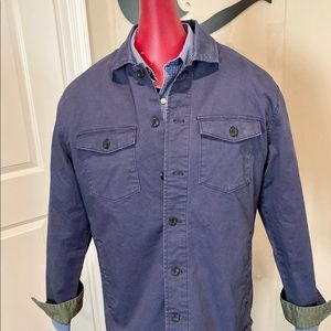 Clear Water Outfitters medium blue shirt Jac, with pockets. Size L.